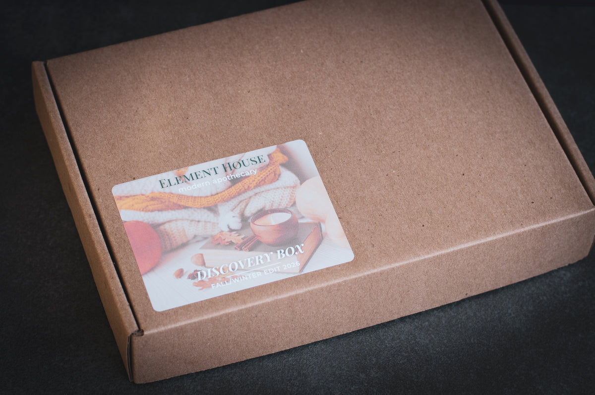 Element House Fall/Winter Discovery Box in a kraft gift box, featuring a seasonal label with cozy candle imagery and “Discovery Box — Fall/Winter Edit 2026” on the lid.