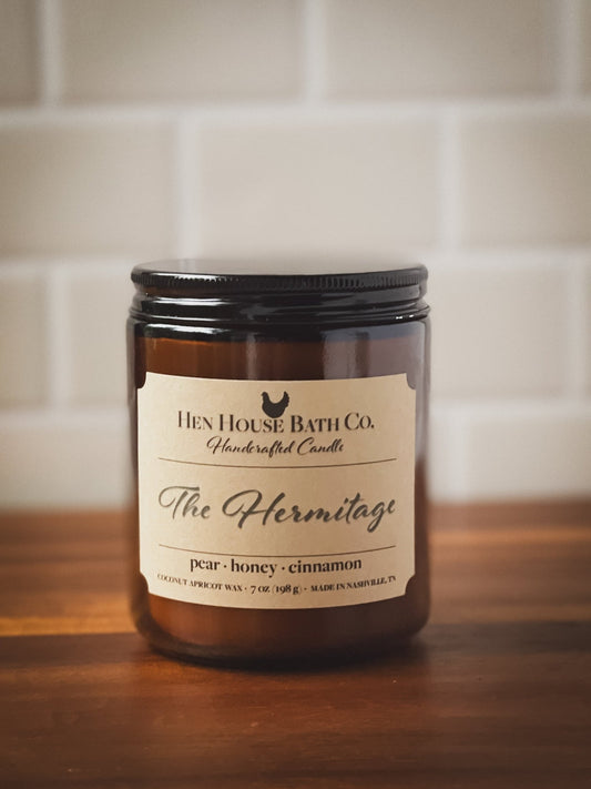 Hand-poured candle inspired by The Hermitage in Tennessee, featuring a fresh fruit scent blend of pear, honey, and apple