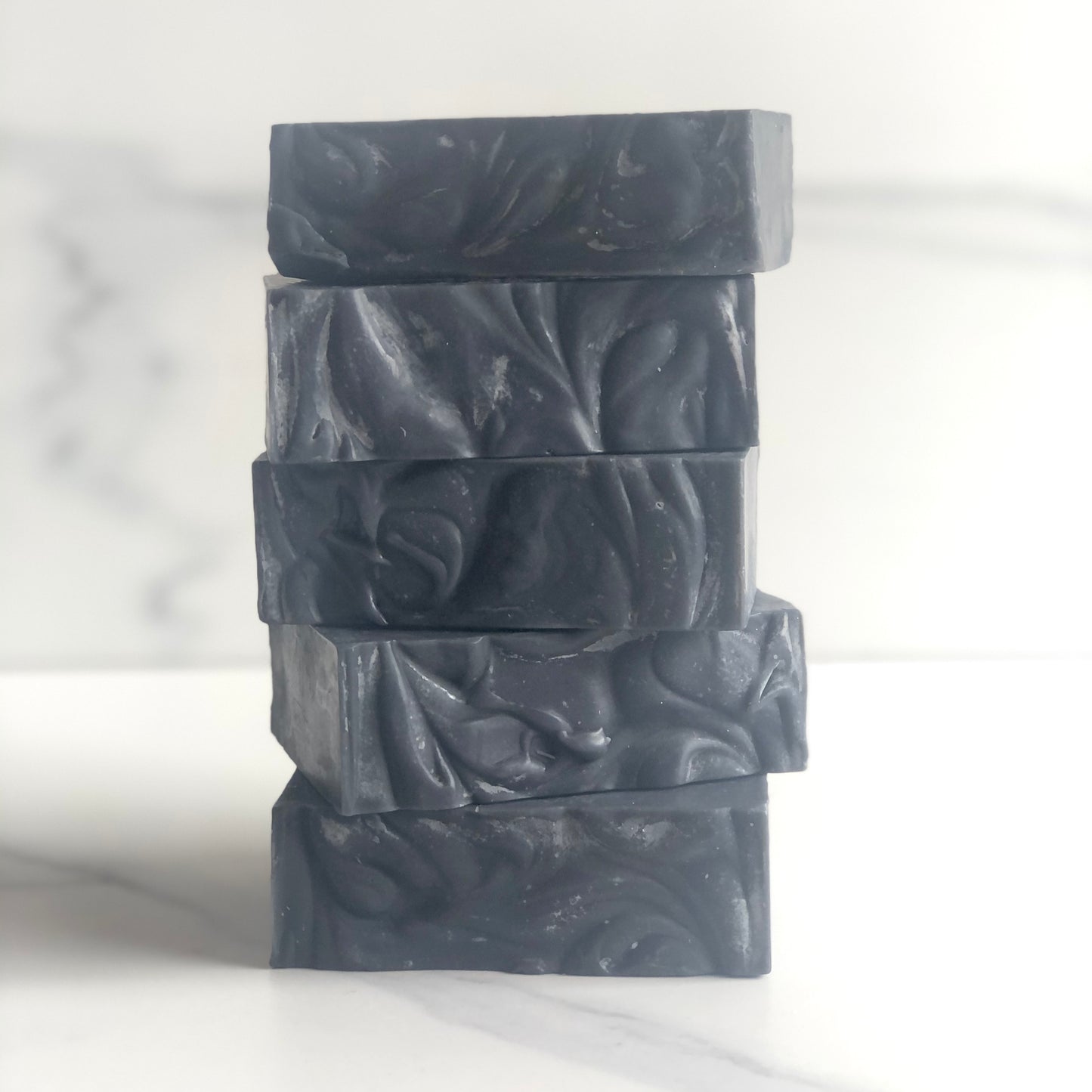 Soap bar made with charcoal, lavender, and tea tree essential oil